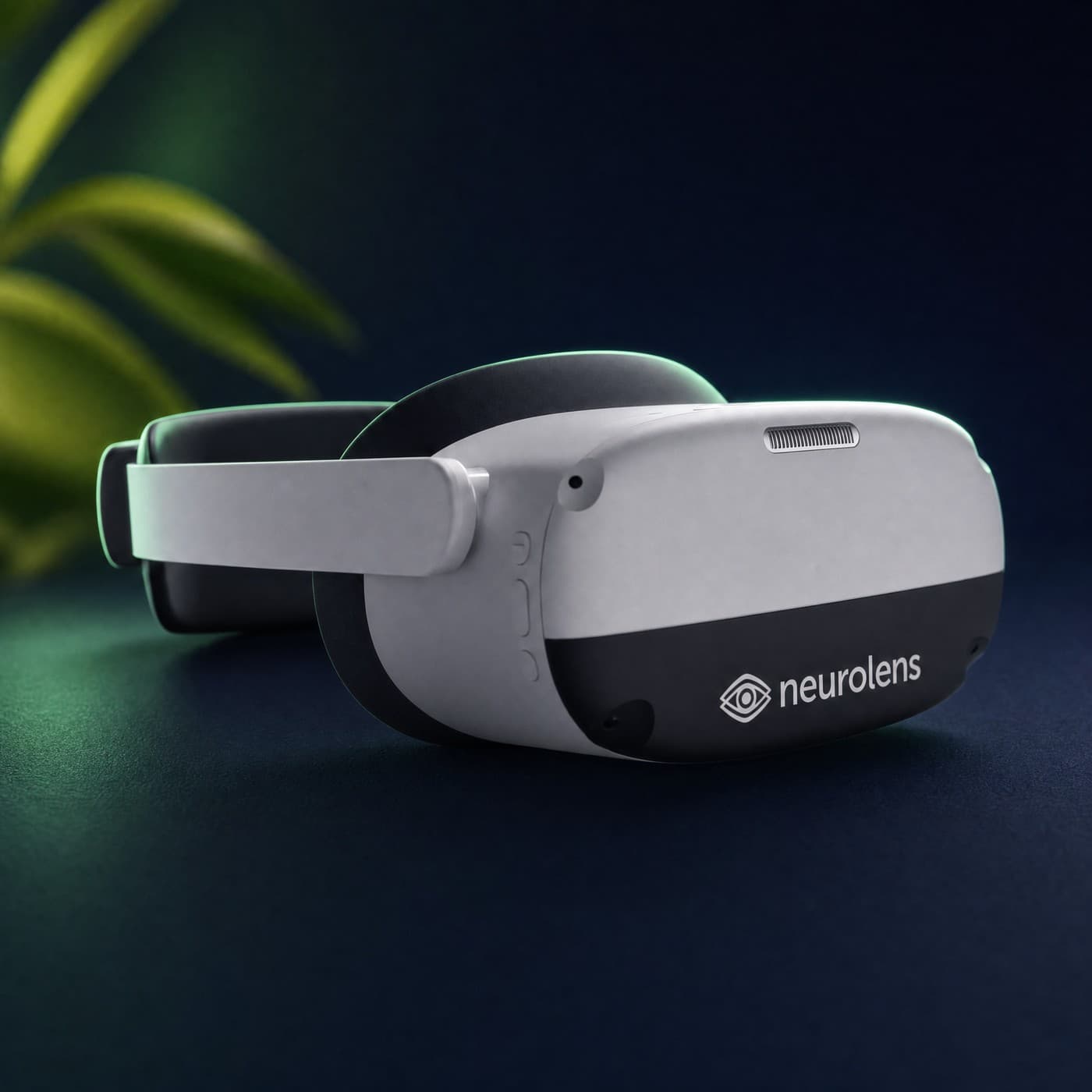 The Neurolens diagnostic headset on a matte deep navy gradient surface with a soft green glow and a backlit leaf, its neurolens wordmark visible